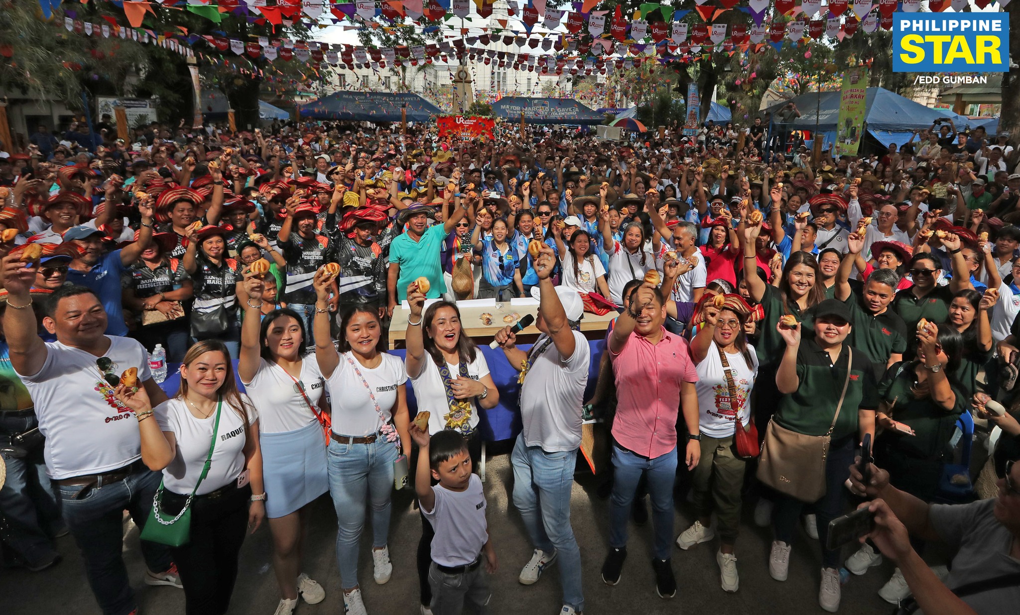 Featured image for “Philippine Star: Individuals partake in the first-ever pinagong eating activity during the 25th Agawan Festival at the Sariaya Quezon Plaza”